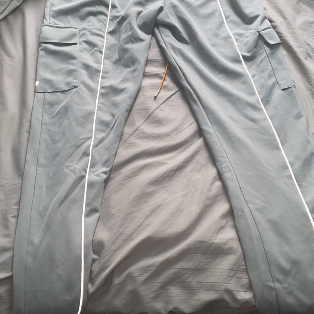 I have some grey EPTM pants they are reflective. Brand new never worn! Size XXL. - Picture 4 of 6